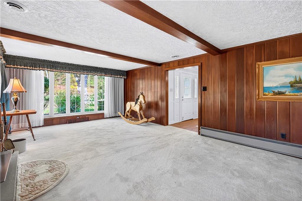 1801 McCorkle Road South Park, PA 15129 - Photo 35 of 49 a furnished livingroom with a window and outdoor space