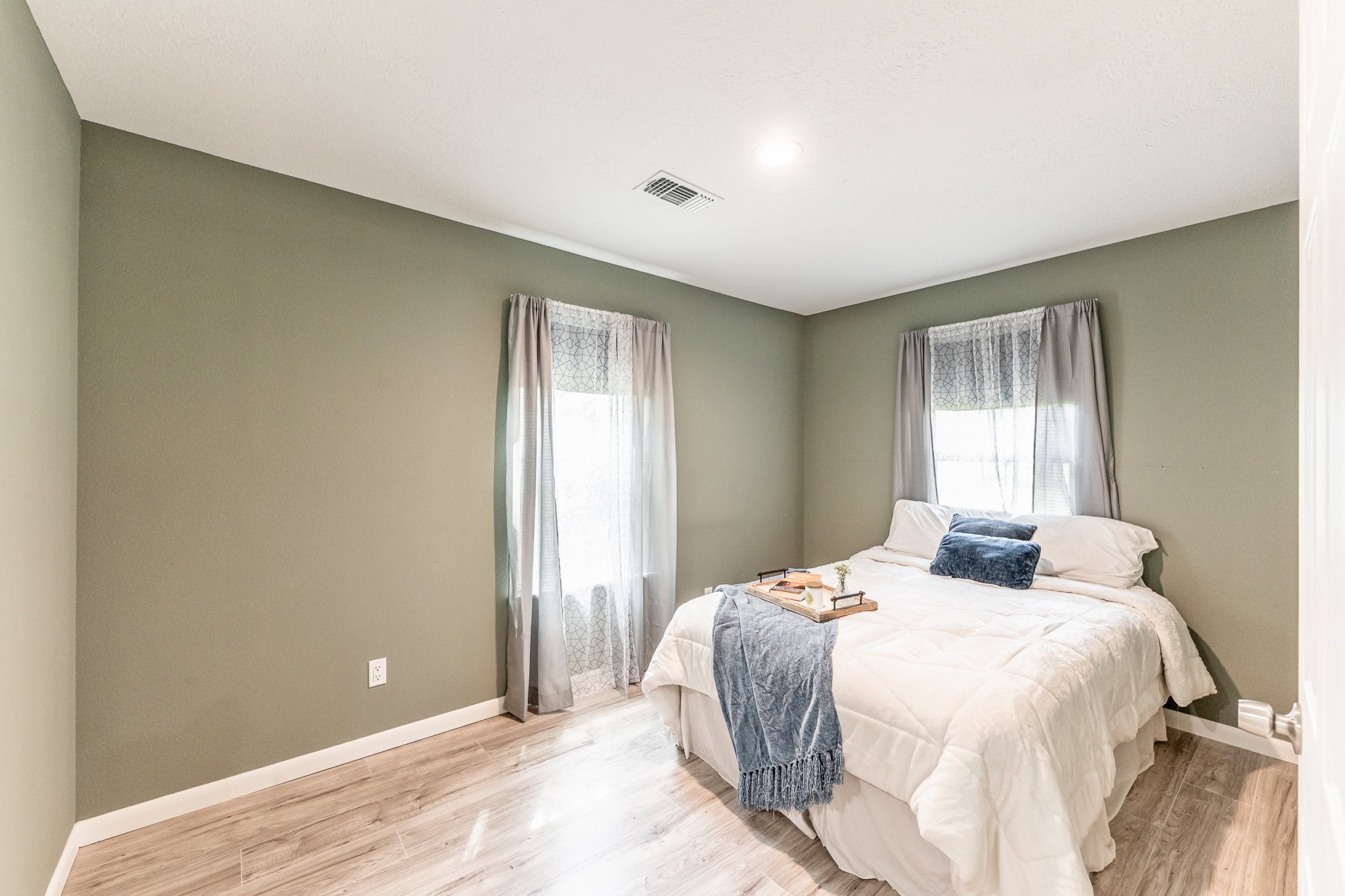 109 Monica Street Trinity, TX 75862 - Photo 13 of 32 a bedroom with a bed and a window