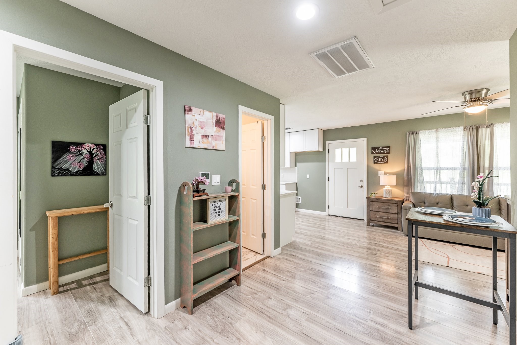109 Monica Street Trinity, TX 75862 - Photo 24 of 32 a view of a livingroom with furniture window and wooden floor