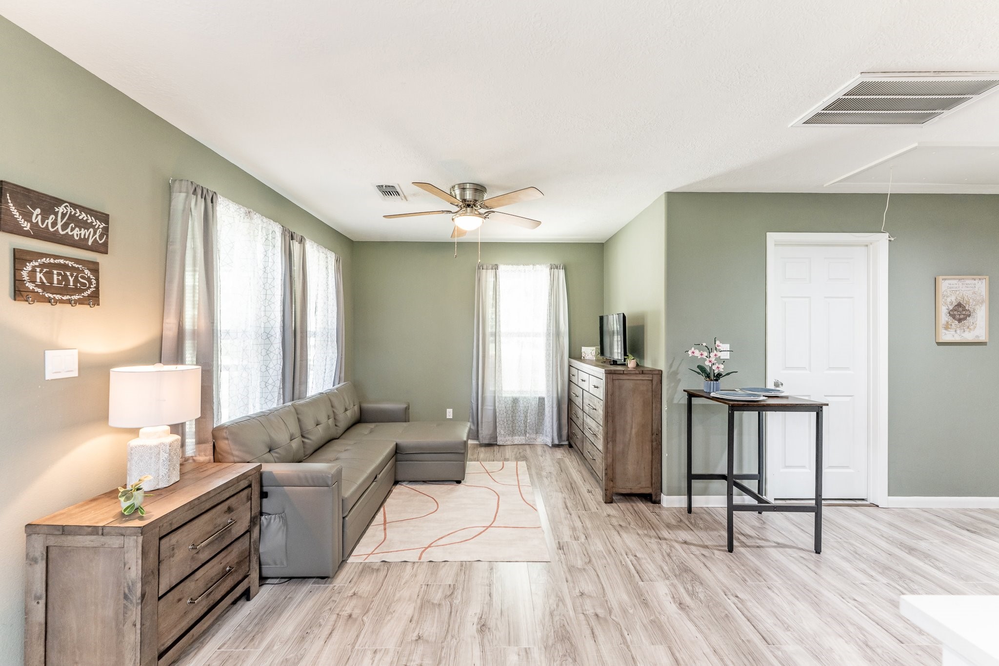 109 Monica Street Trinity, TX 75862 - Photo 8 of 32 a living room with furniture and a wooden floor