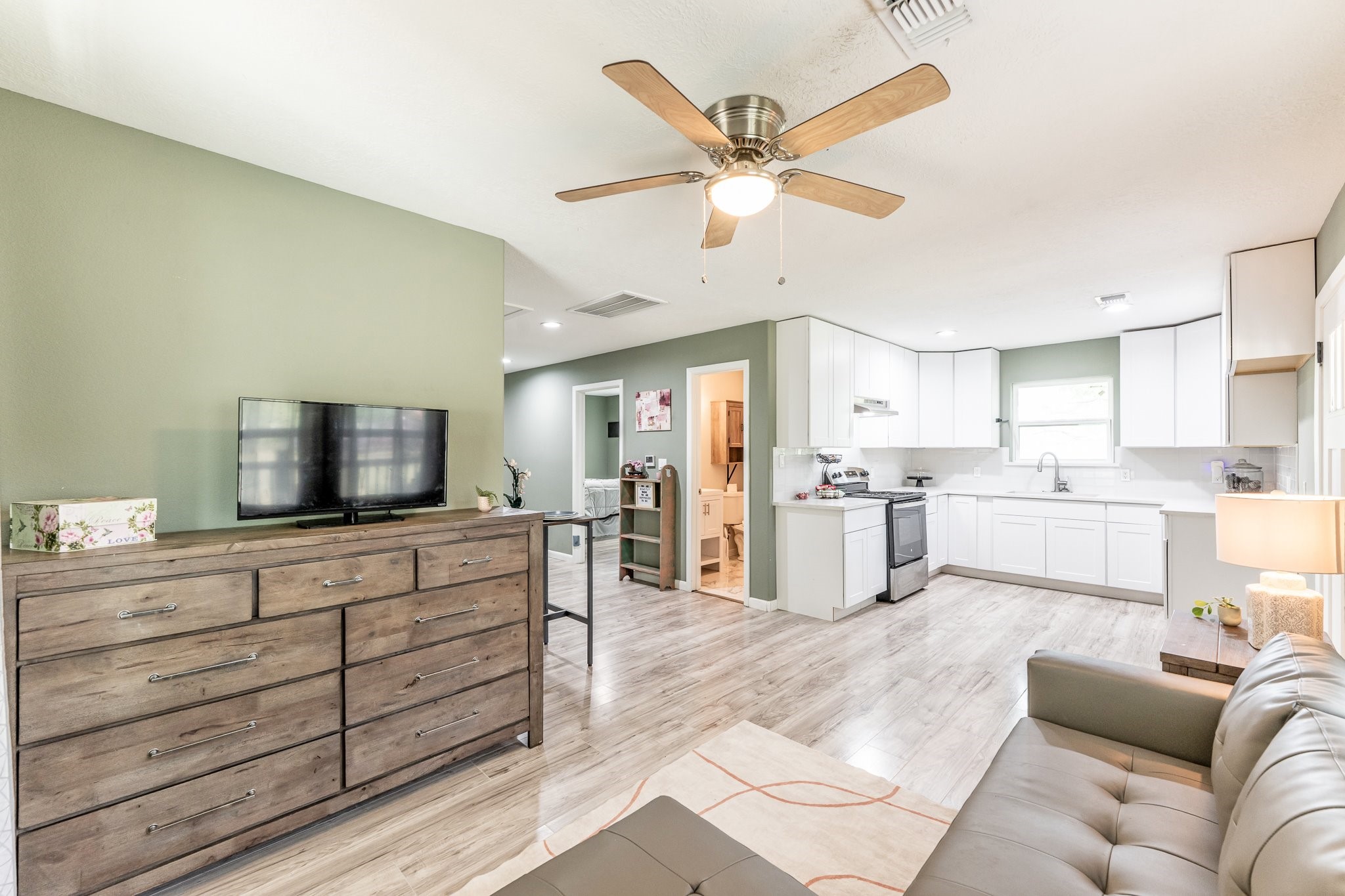 109 Monica Street Trinity, TX 75862 - Photo 10 of 32 a living room with furniture and kitchen view