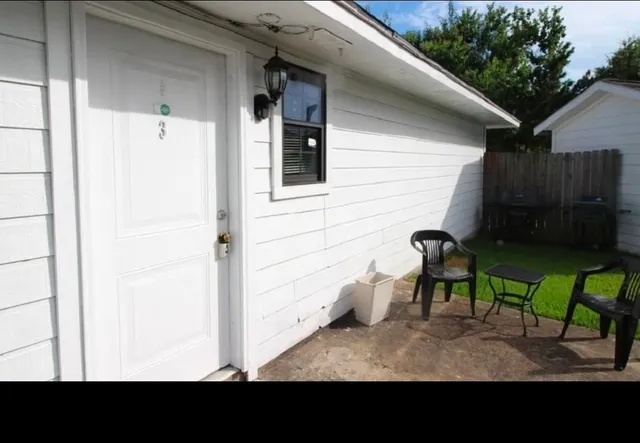a view of a porch with furniture