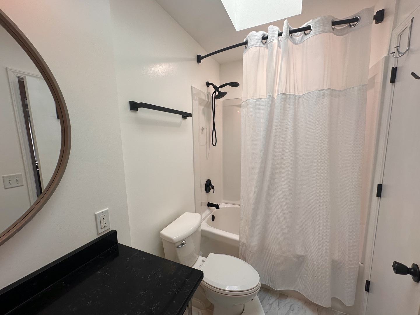 5 Shermead Road Montgomery, IL 60538 - Photo 13 of 27 a bathroom with a toilet a sink and shower