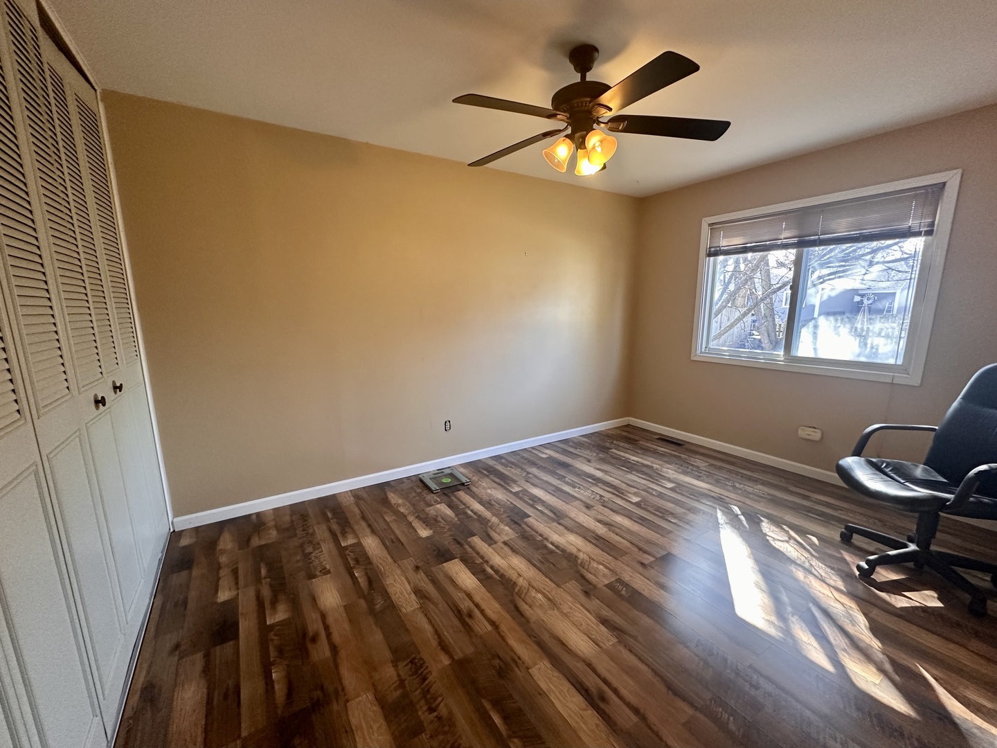 5 Shermead Road Montgomery, IL 60538 - Photo 14 of 27 a view of workspace with wooden floor and window