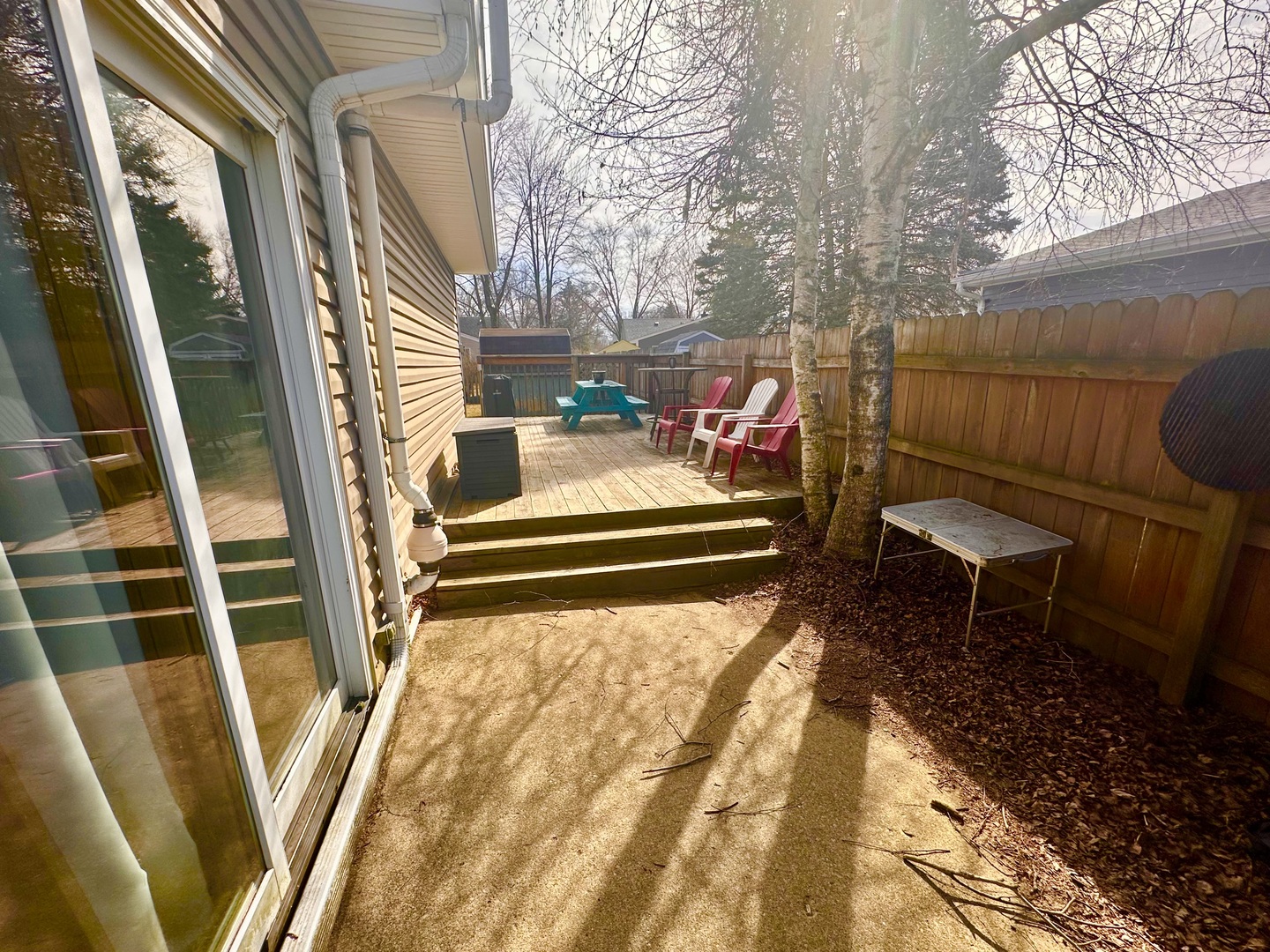 5 Shermead Road Montgomery, IL 60538 - Photo 25 of 27 a backyard of a house with table and chairs