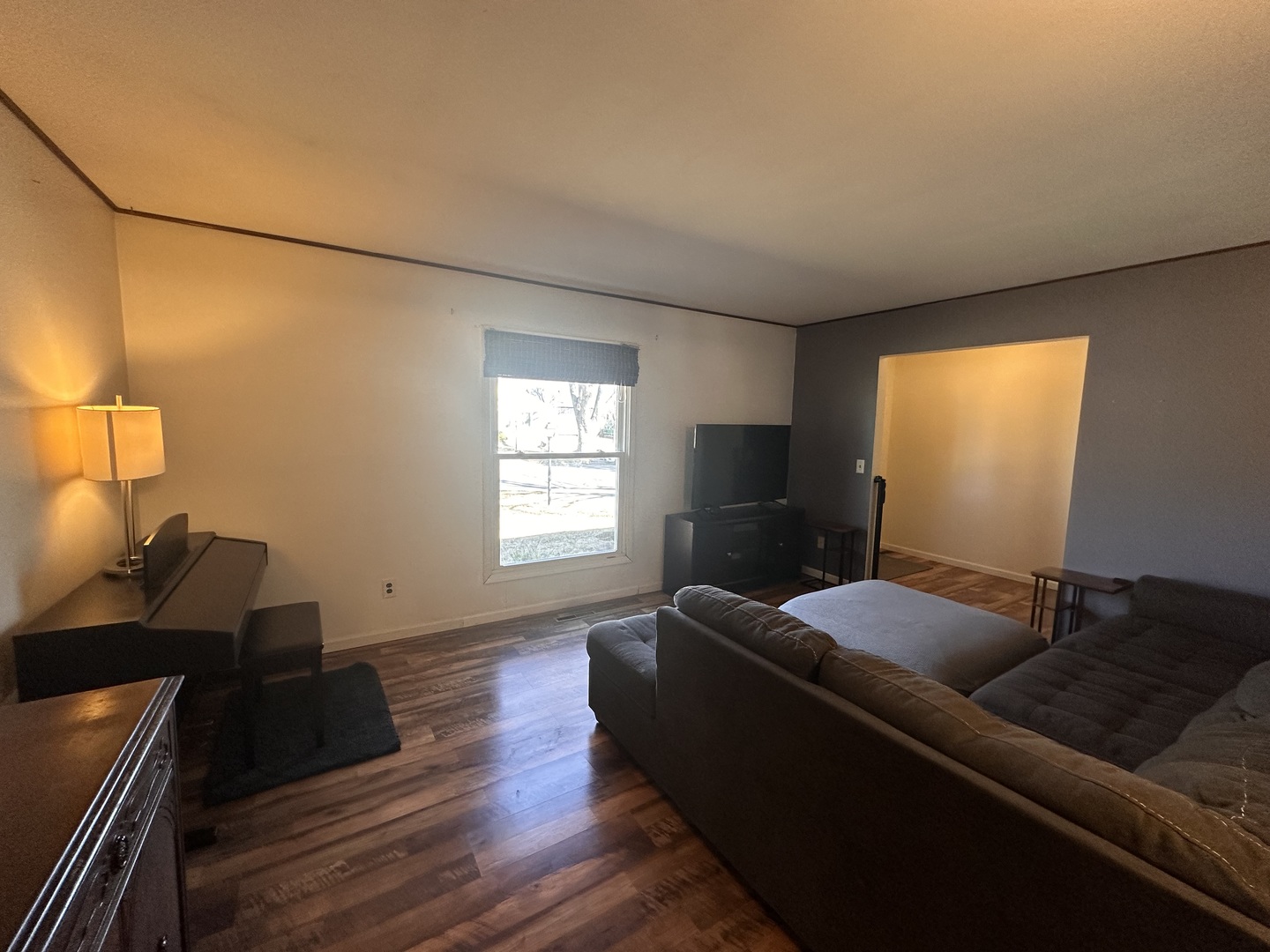 5 Shermead Road Montgomery, IL 60538 - Photo 3 of 27 a living room with furniture and a flat screen tv