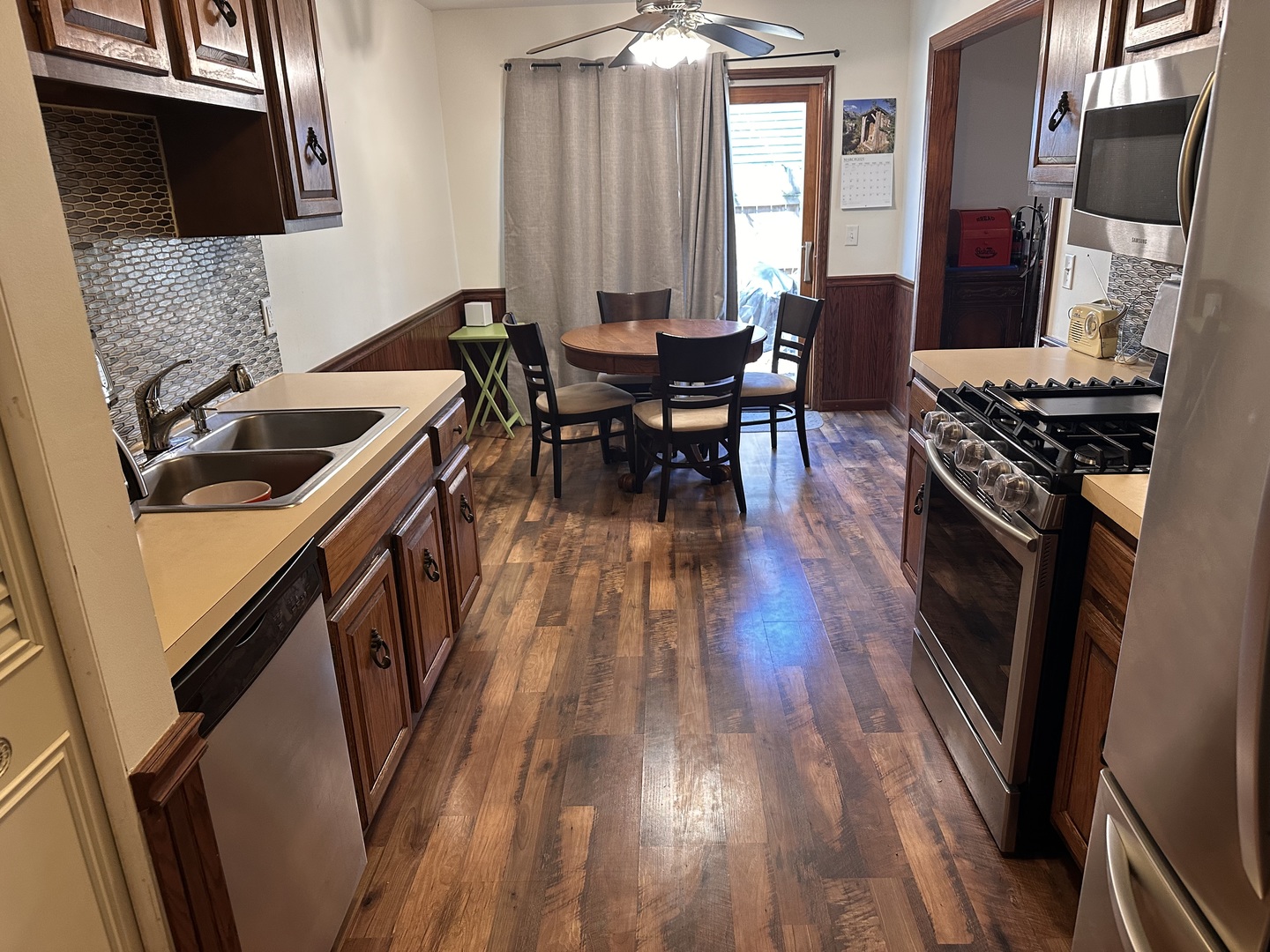 5 Shermead Road Montgomery, IL 60538 - Photo 5 of 27 a kitchen with sink stove and refrigerator