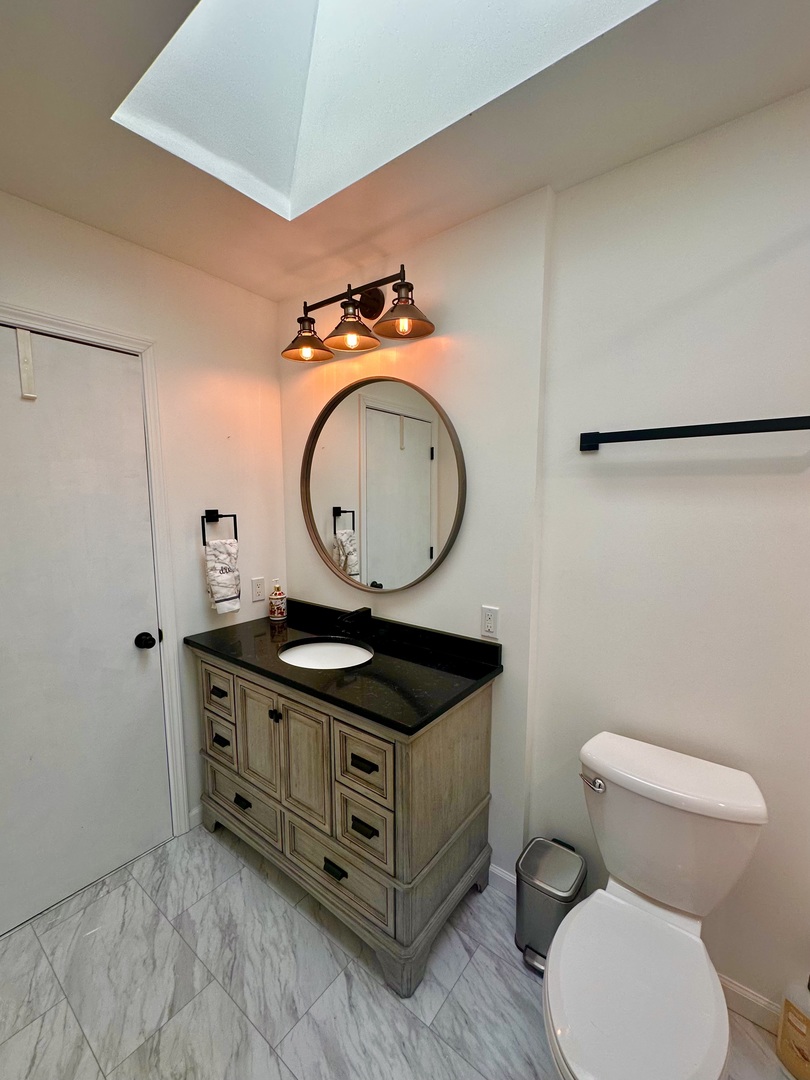 5 Shermead Road Montgomery, IL 60538 - Photo 10 of 27 a bathroom with a toilet mirror vanity and a sink