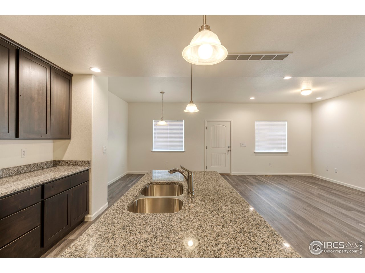 4355 24th Street Road, Unit 3702 Greeley, CO 80634 - Photo 3 of 11 From the kitchen facing the living room