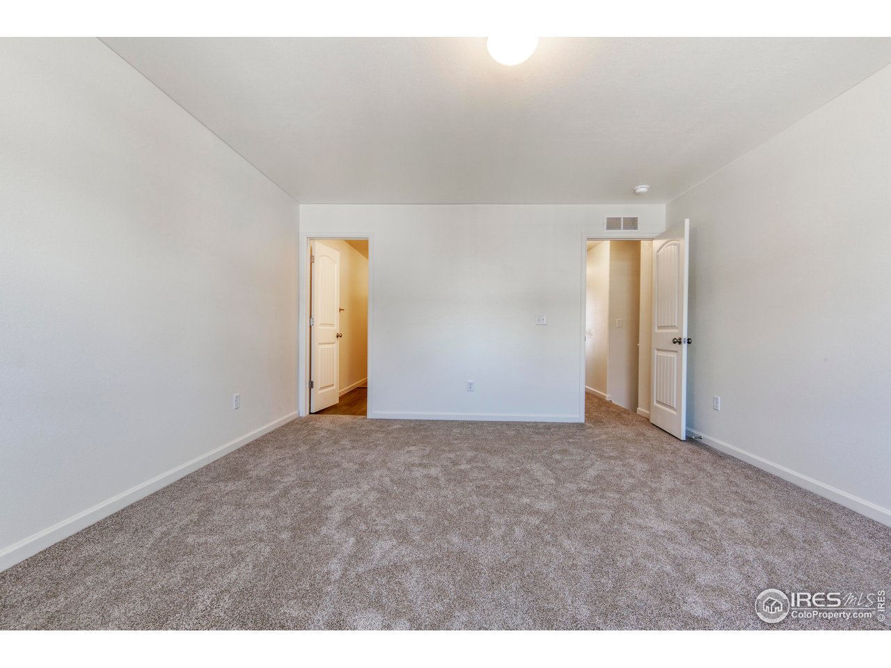 4355 24th Street Road, Unit 3702 Greeley, CO 80634 - Photo 7 of 11 Primary bedroom