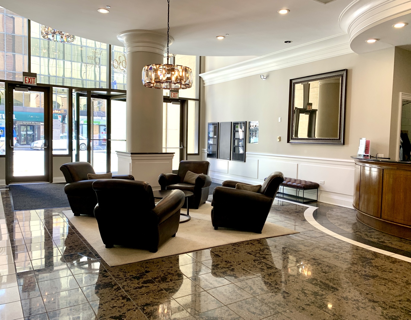 630 North State Street, Unit 2207 Chicago, IL 60654 - Photo 12 of 13 a living room with furniture large window and chandelier