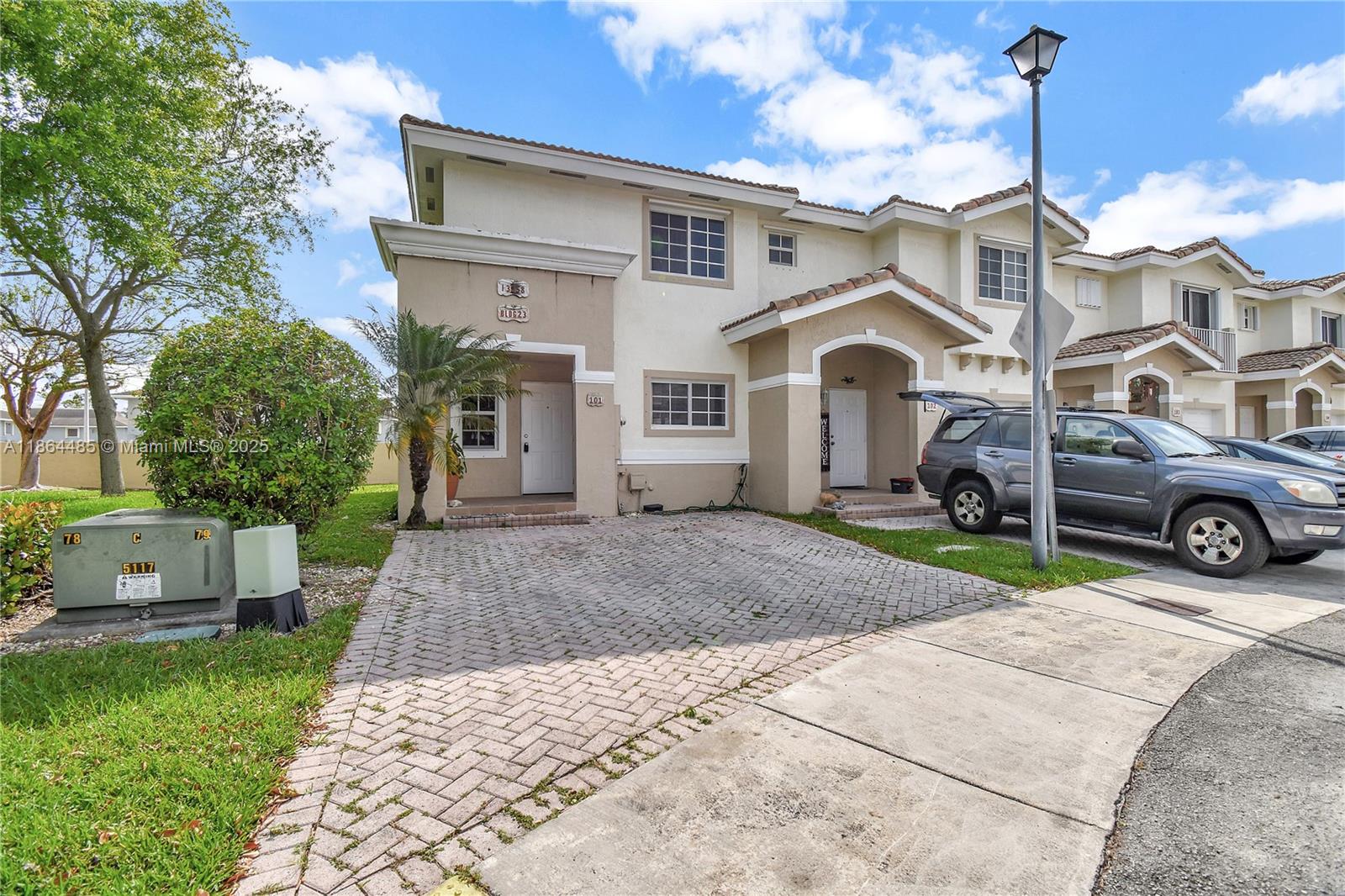 13958 Southwest 260th Street, Unit 101 Homestead, FL 33032 - Photo 2 of 35