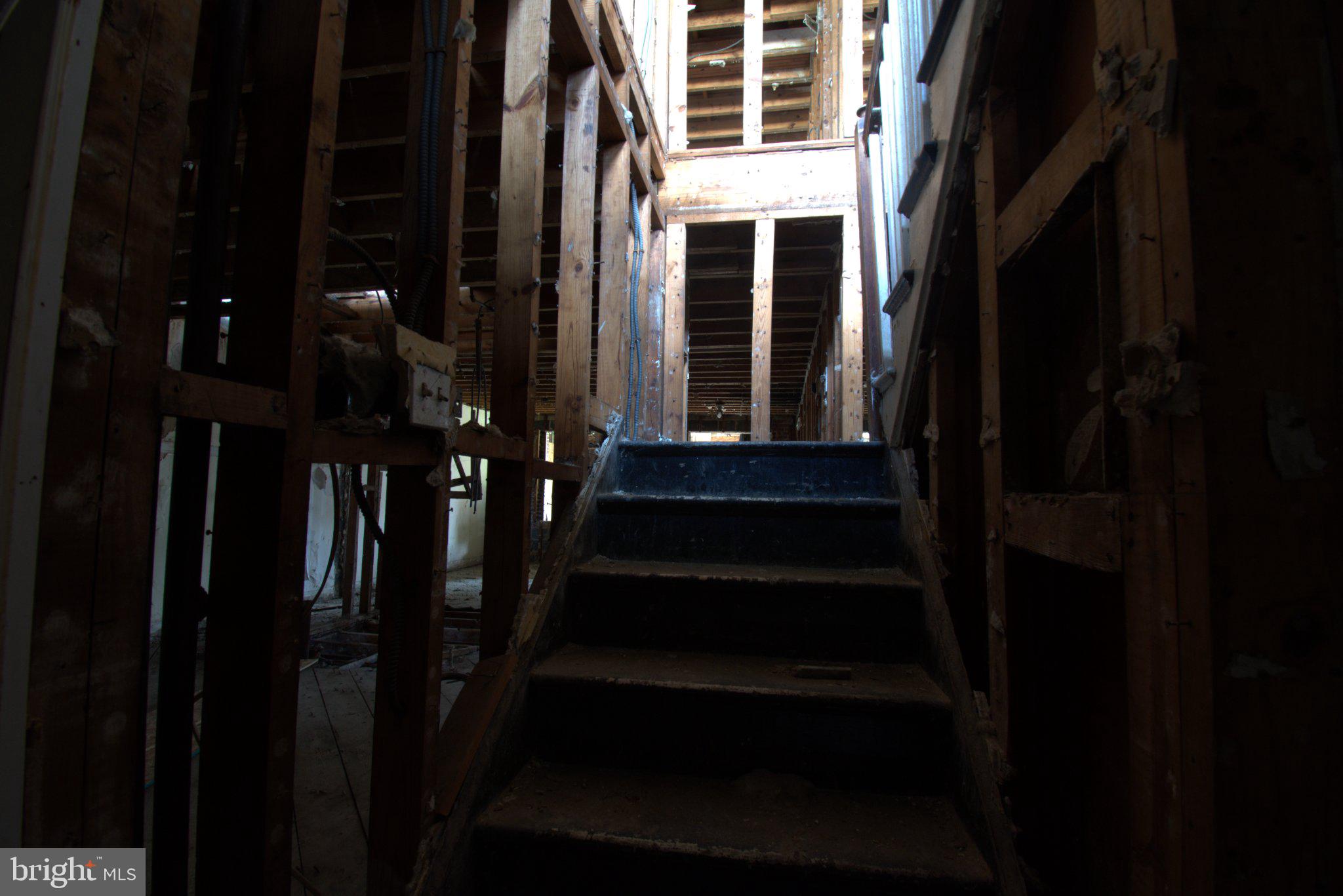 1219 Simms Place Northeast Washington, DC 20002 - Photo 3 of 7 Stairway to renovation potential.