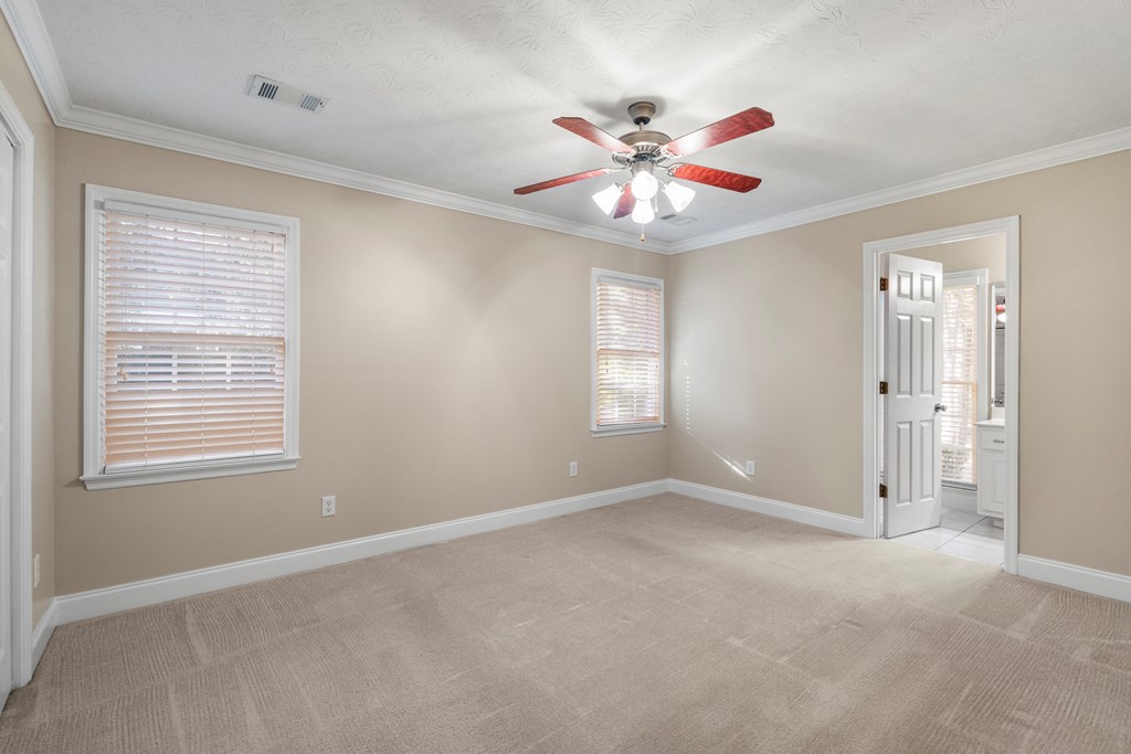 1009 Crosswinds Drive Midland, GA 31820 - Photo 17 of 29 a view of an empty room with a window