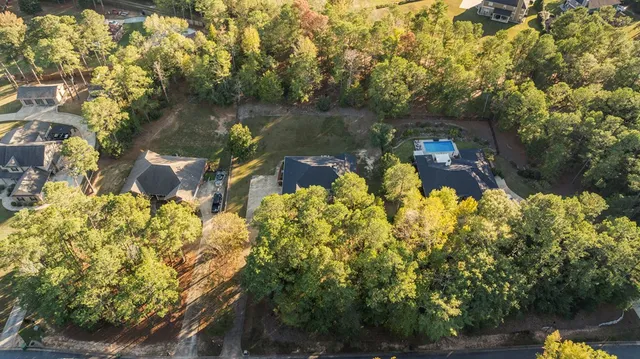 a view of a lake with a yard