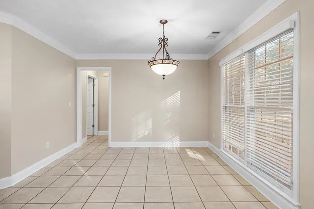 a view of an empty room with window