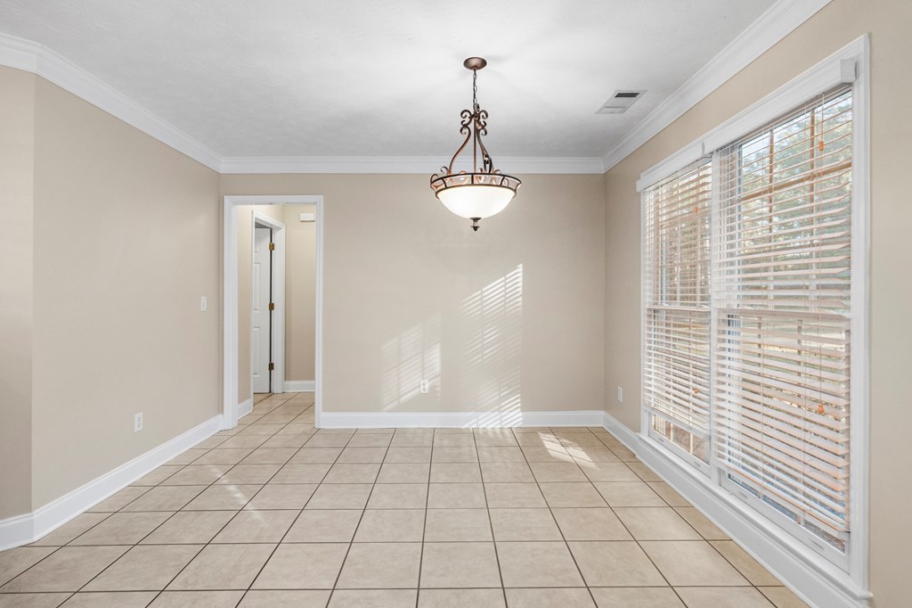 1009 Crosswinds Drive Midland, GA 31820 - Photo 9 of 29 a view of an empty room with window