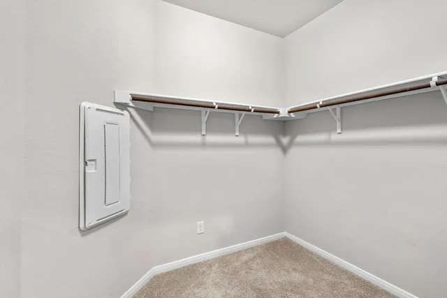 a view of an empty walk in closet