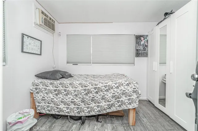 a room with a bed and a window