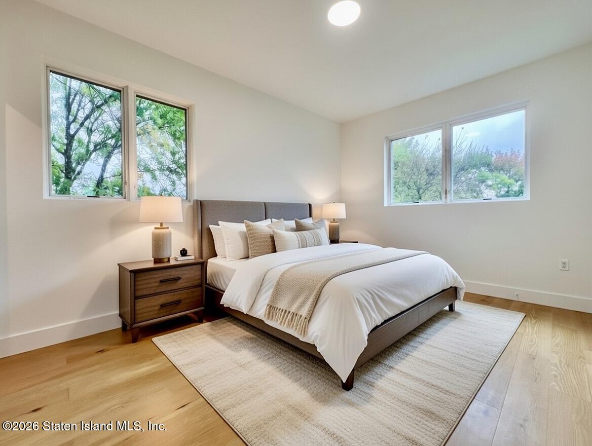 3865 Amboy Road, Unit 2G Staten Island, NY 10308 - Photo 15 of 27 a bedroom with a bed and window