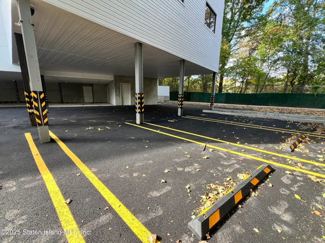 view of living room with furniture and floor to ceiling window