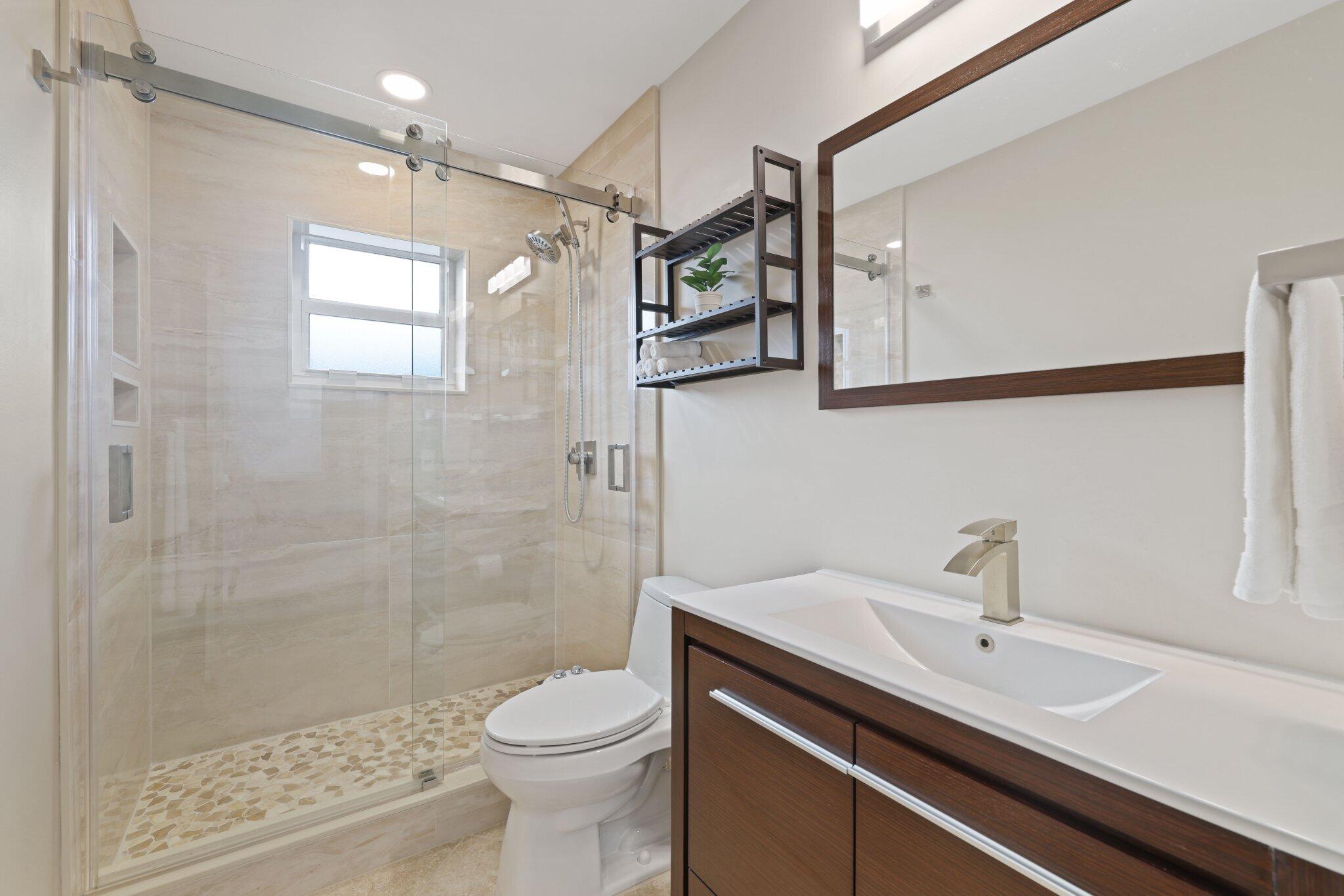 116 Cameron Drive Weston, FL 33326 - Photo 24 of 75 a bathroom with a sink a toilet and shower