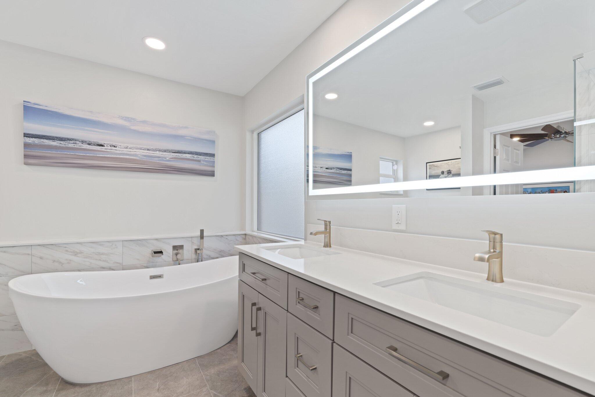 116 Cameron Drive Weston, FL 33326 - Photo 34 of 75 a bathroom with a sink and a bathtub