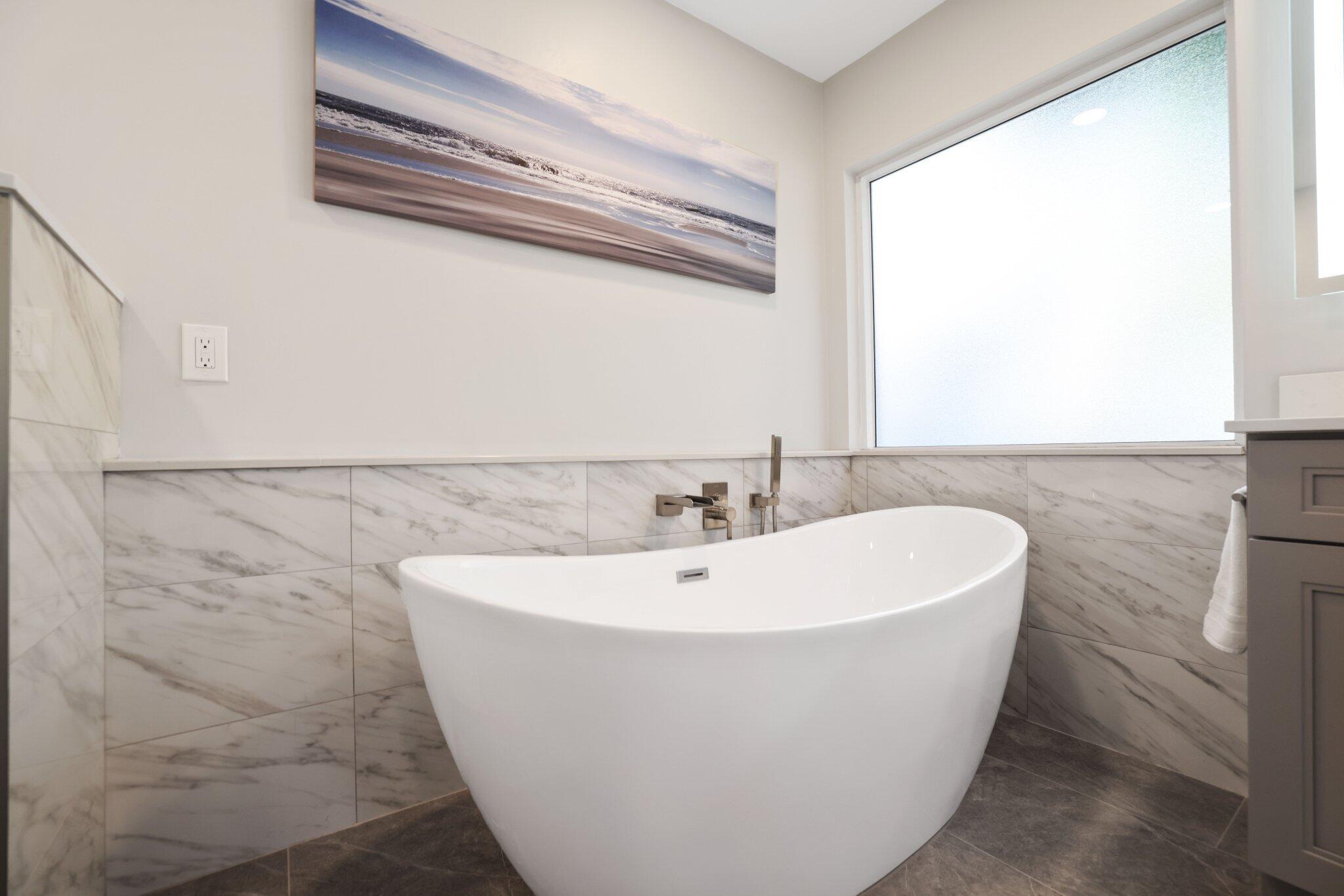 116 Cameron Drive Weston, FL 33326 - Photo 35 of 75 a white bath tub sitting in a bathroom