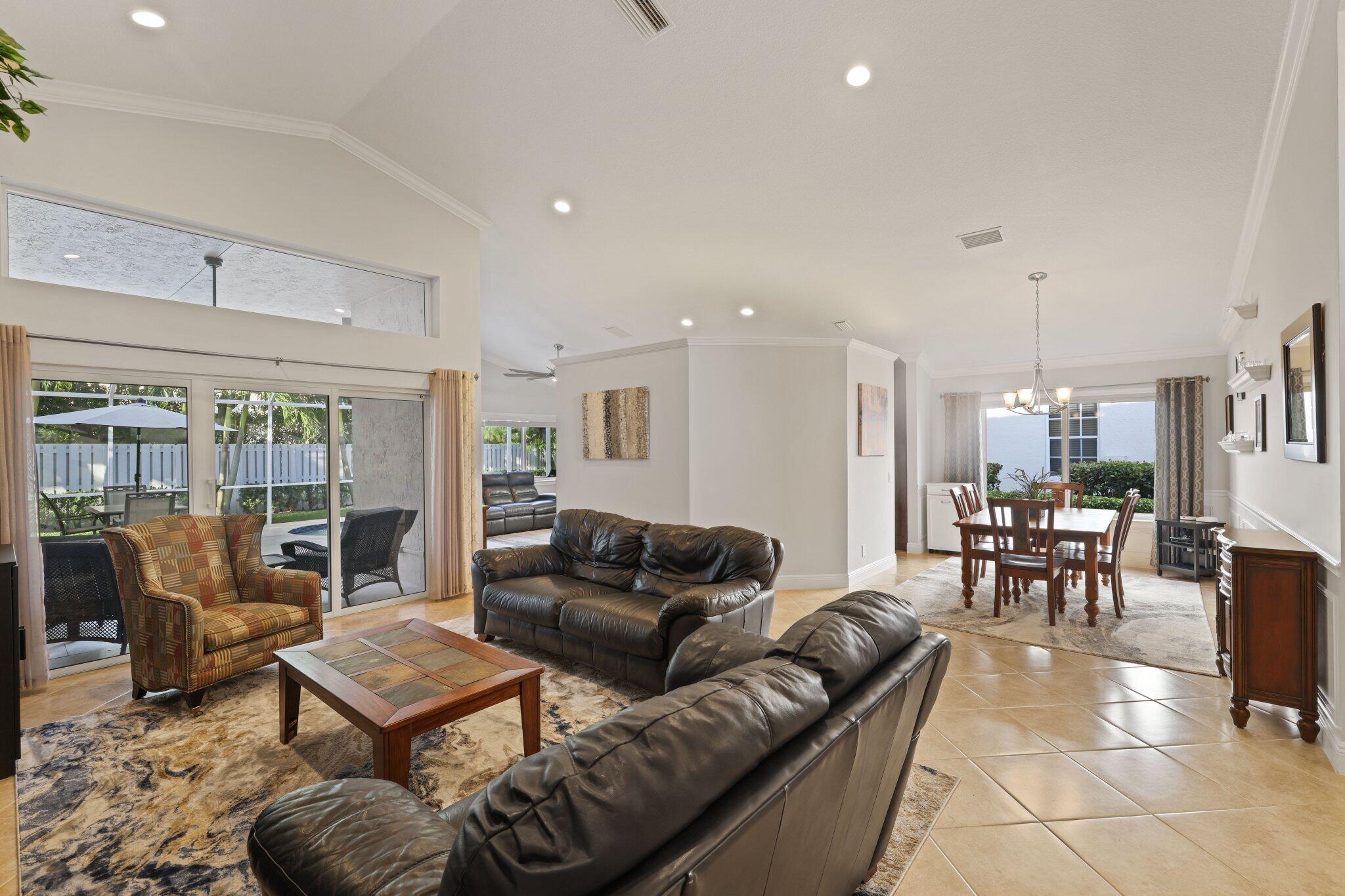 116 Cameron Drive Weston, FL 33326 - Photo 4 of 75 a living room with furniture and a large window