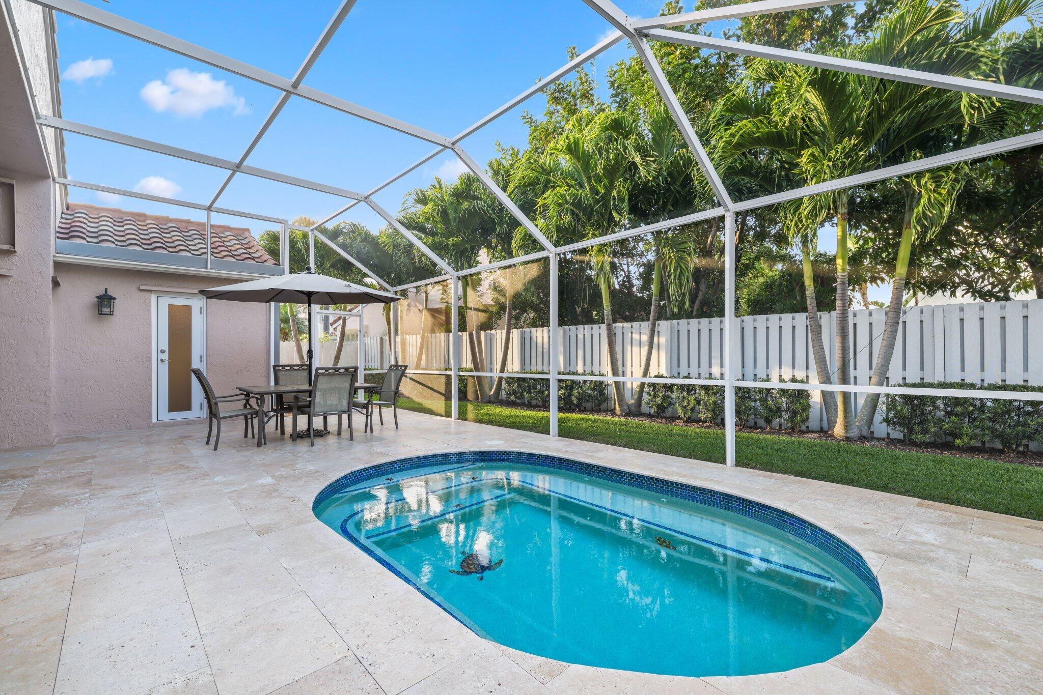 116 Cameron Drive Weston, FL 33326 - Photo 41 of 75 a view of a swimming pool with a porch