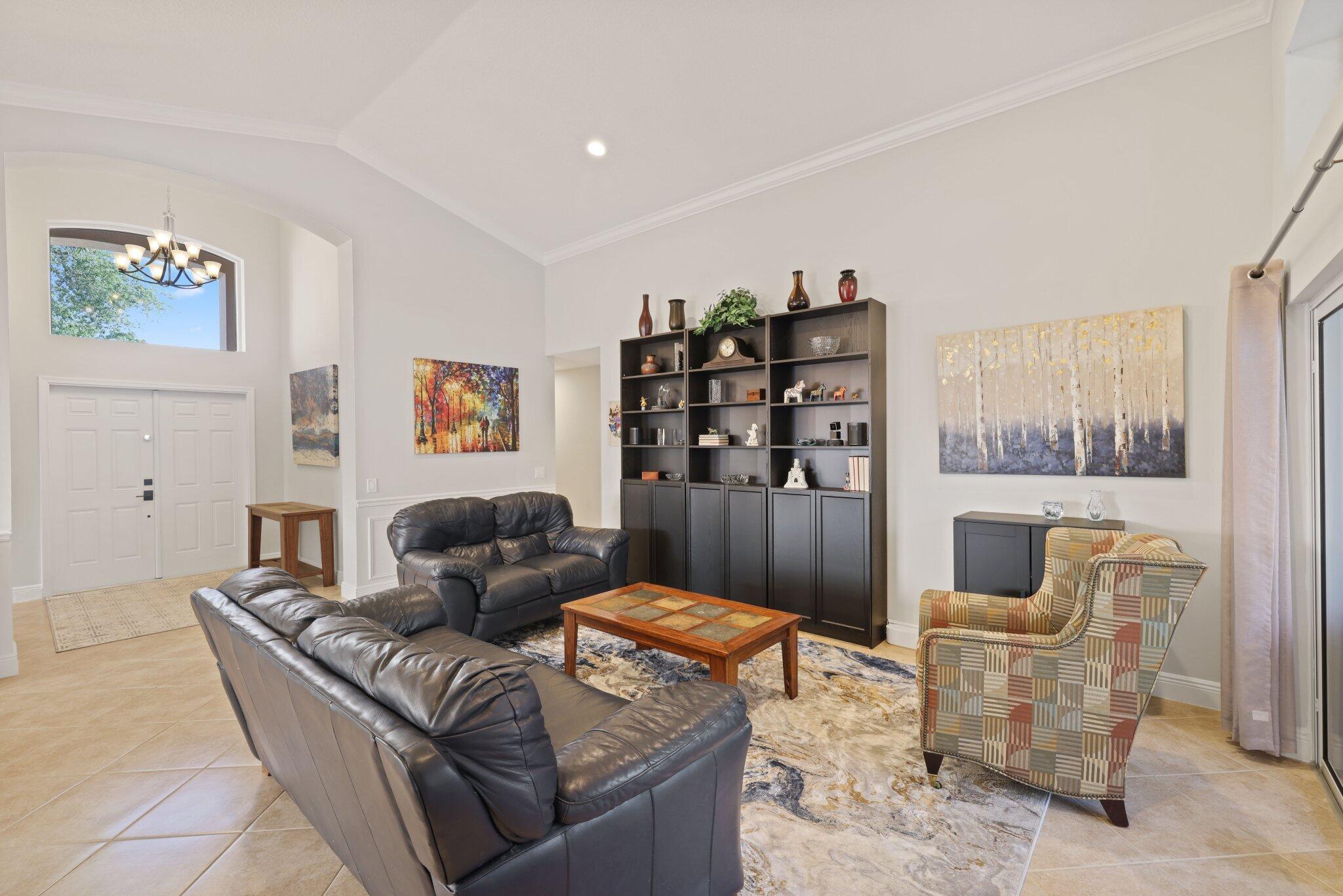 116 Cameron Drive Weston, FL 33326 - Photo 5 of 75 a living room with furniture and a window