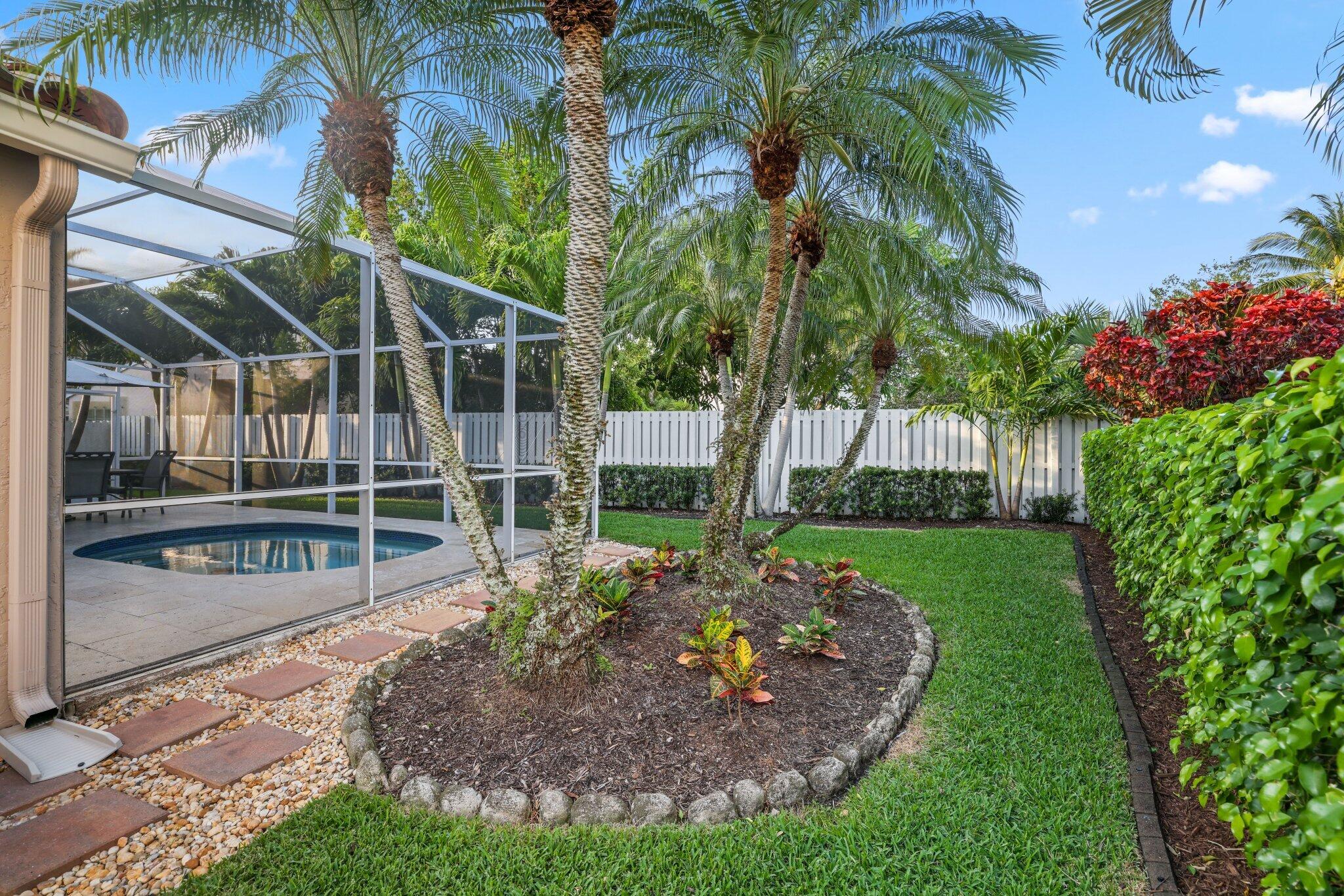 116 Cameron Drive Weston, FL 33326 - Photo 54 of 75 a view of a backyard with plants