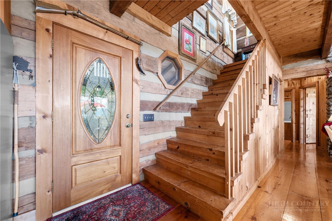 2177 Homestead Road Todd, NC 28684 - Photo 16 of 49 a view of entryway and hall with wooden floor