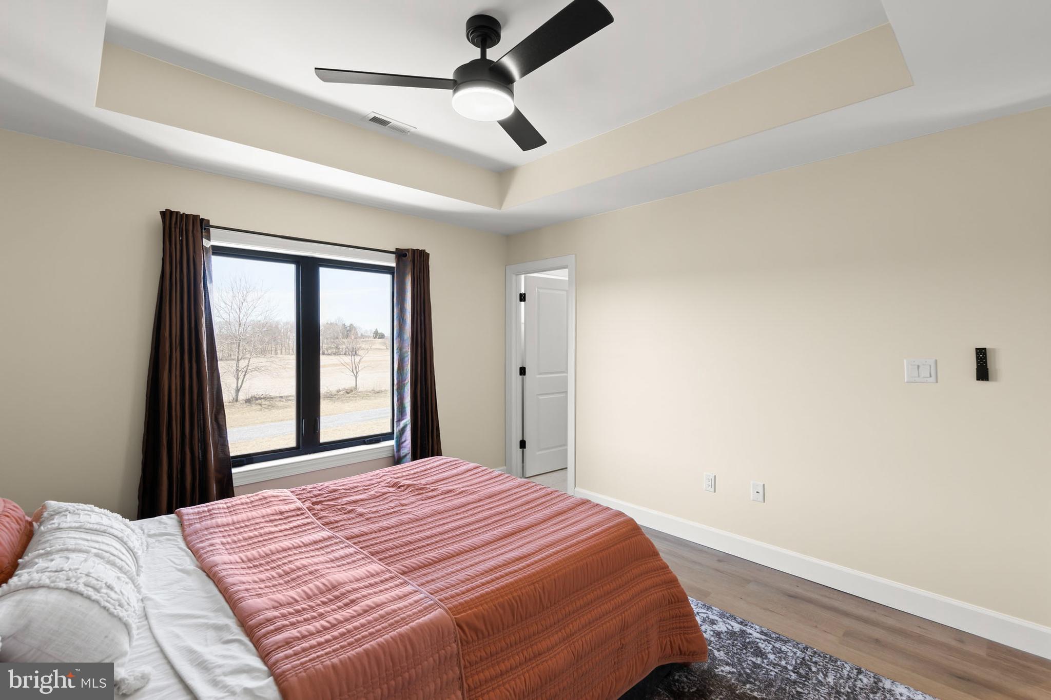 1868 Withers Larue Road Summit Point, VA 25446 - Photo 35 of 65 a bedroom with a bed and a window