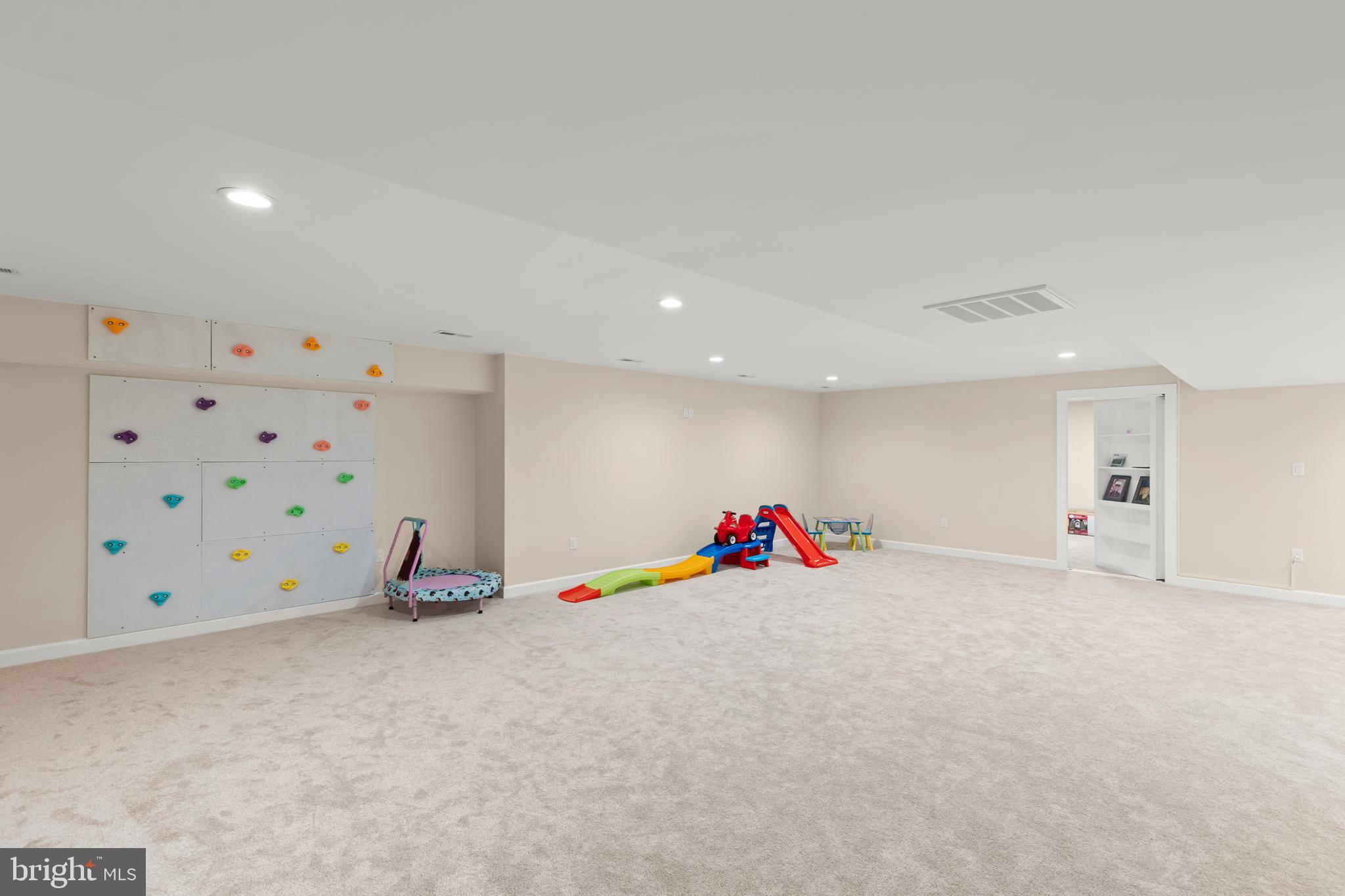 1868 Withers Larue Road Summit Point, VA 25446 - Photo 53 of 65 a view of an empty room with a flat screen tv