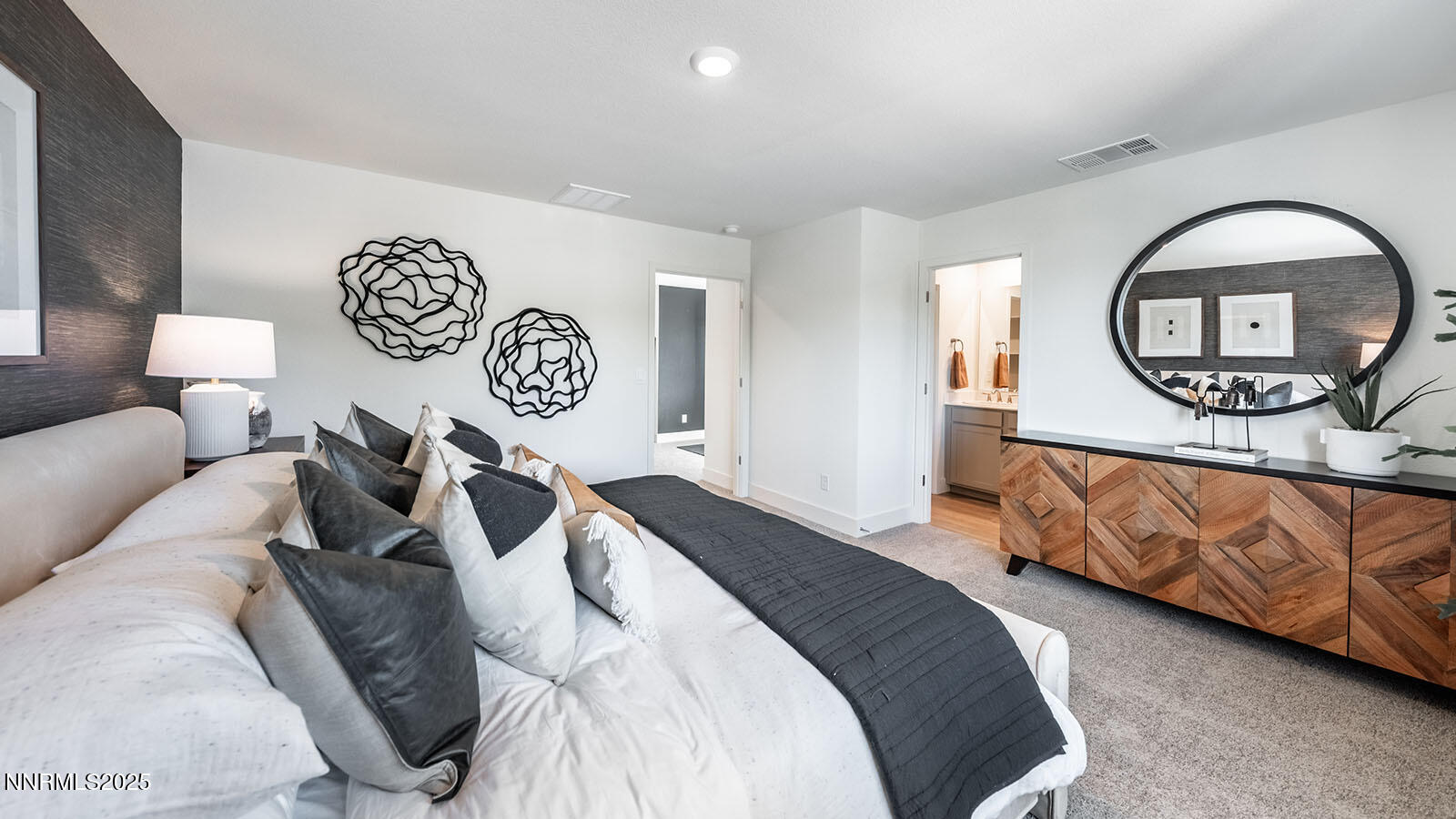 5857 Morgan Horse Street Reno, NV 89523 - Photo 14 of 23 a bedroom with a bed and a painting on the wall