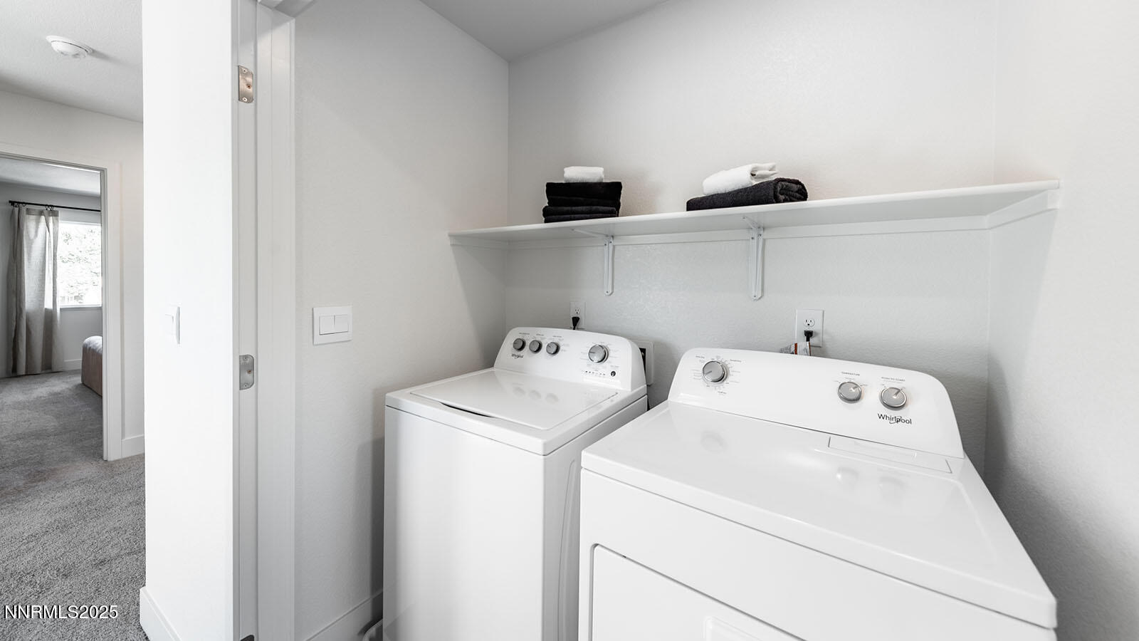 5857 Morgan Horse Street Reno, NV 89523 - Photo 23 of 23 a utility room with dryer and washer