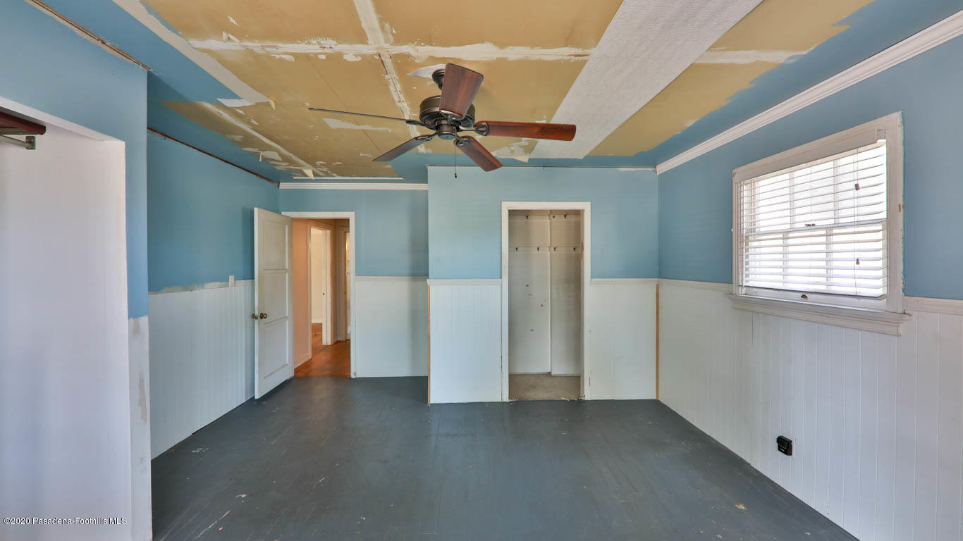 11364 Lambert Avenue El Monte, CA 91732 - Photo 21 of 39 a view of a livingroom with a ceiling fan and window