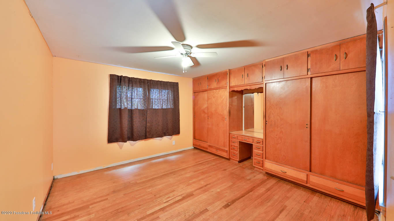 11364 Lambert Avenue El Monte, CA 91732 - Photo 24 of 39 a view of an empty room with window and wooden floor