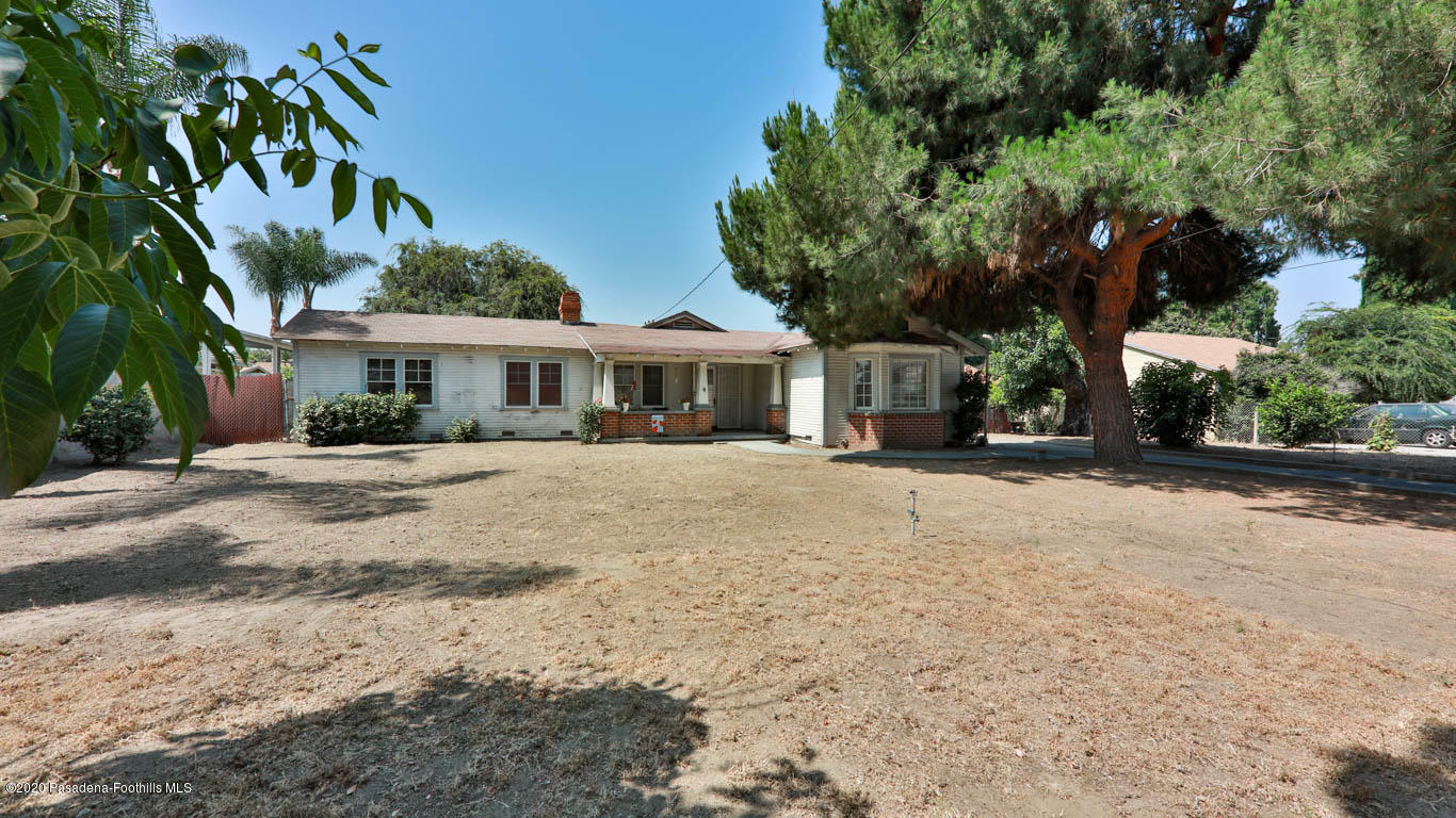 11364 Lambert Avenue El Monte, CA 91732 - Photo 38 of 39 a front view of a house with a yard