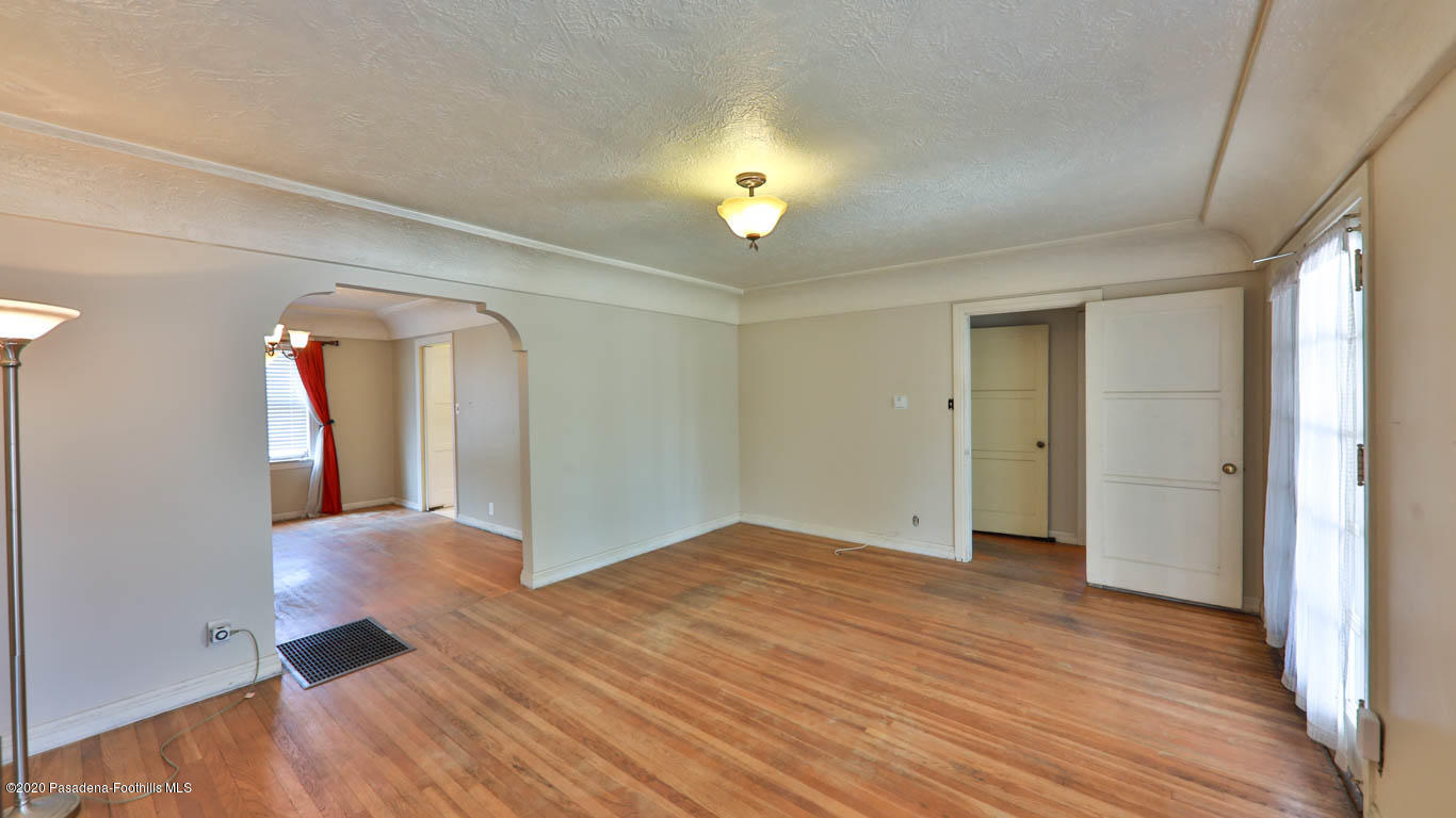 11364 Lambert Avenue El Monte, CA 91732 - Photo 7 of 39 a view of a livingroom with wooden floor
