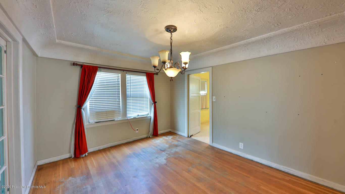 11364 Lambert Avenue El Monte, CA 91732 - Photo 9 of 39 wooden floor in an empty room with a window