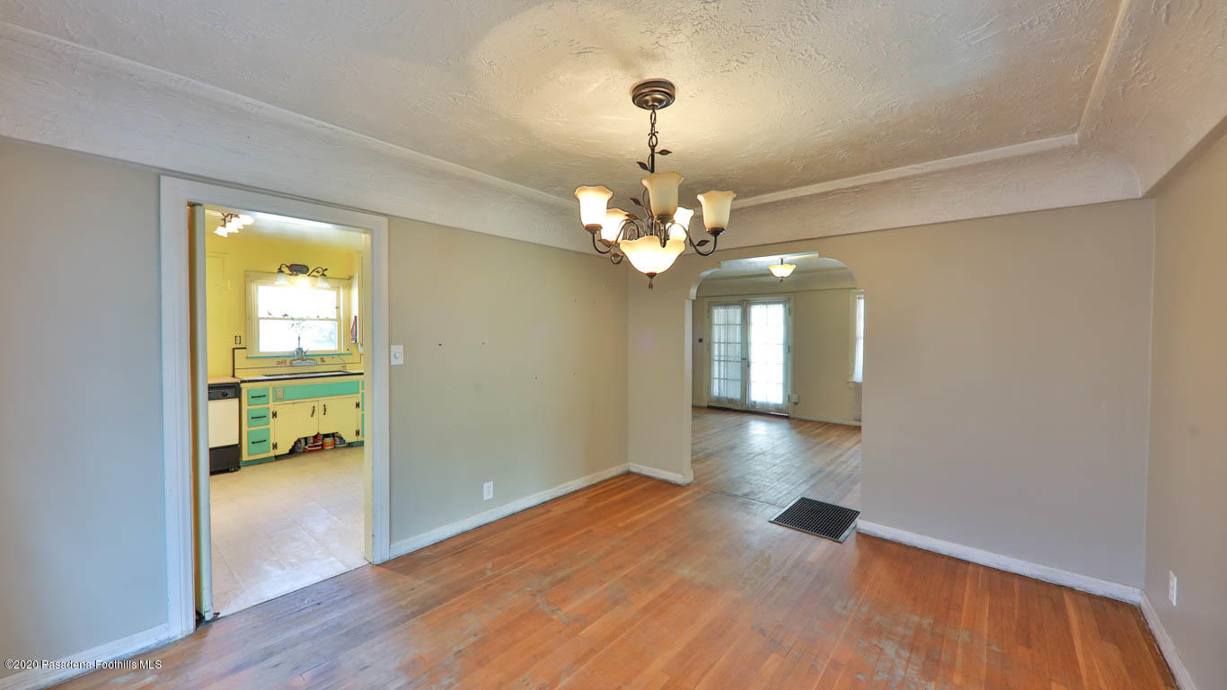 11364 Lambert Avenue El Monte, CA 91732 - Photo 10 of 39 a view of livingroom and kitchen with wooden floor