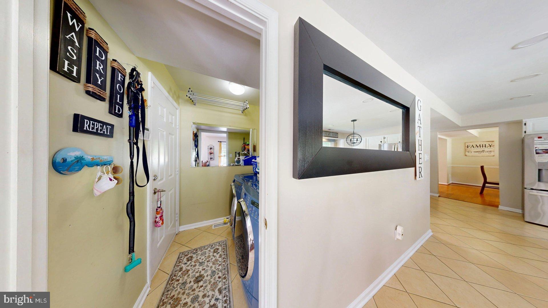11901 Rustic Farm Court Germantown, MD 20874 - Photo 22 of 134 Charming entryway with modern flair.