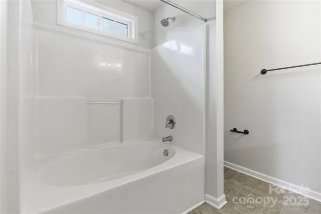 a close view of a bathtub in bathroom