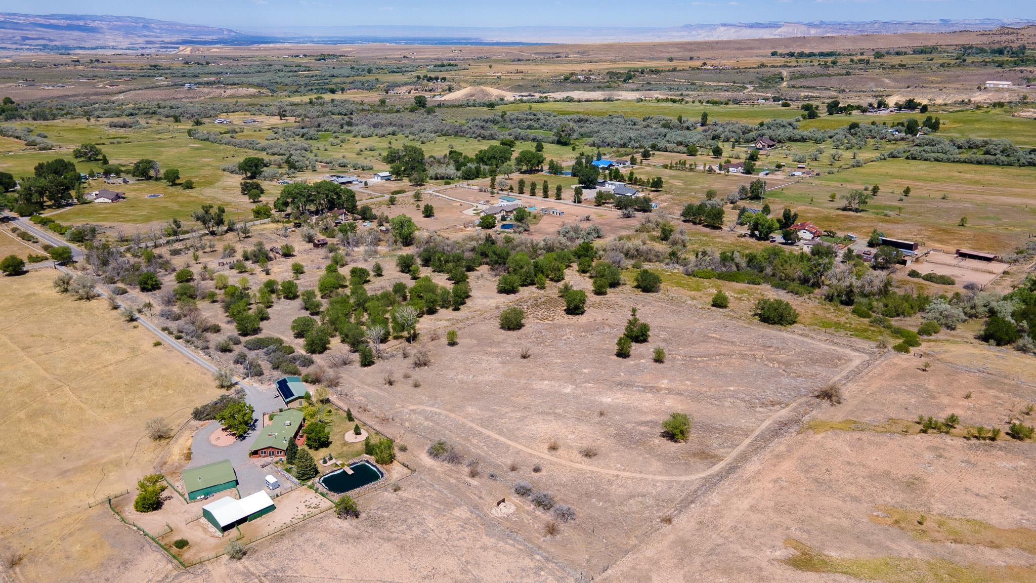3003 Purdy Mesa Road Whitewater, CO 81527 - Photo 11 of 33 an aerial view of a house with a yard