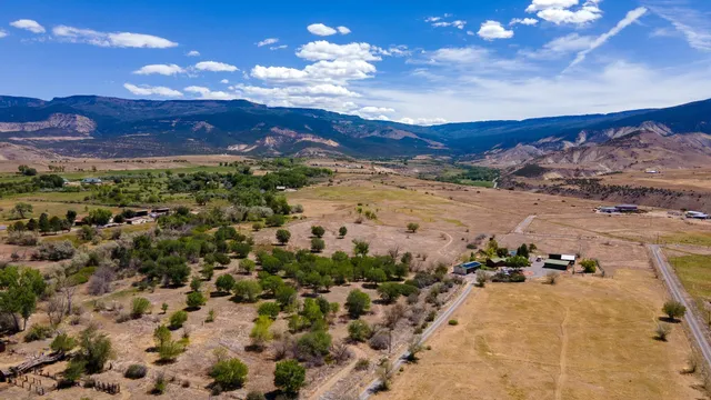 a view of ocean and mountain