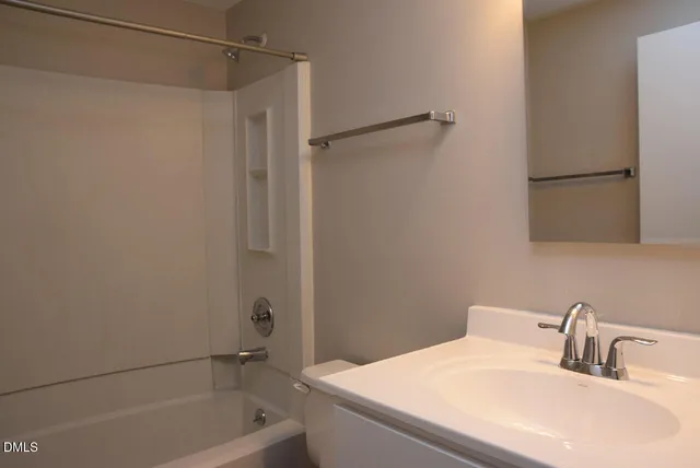 a bathroom with a sink and a bathtub
