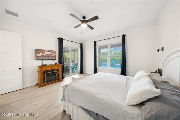 a bathroom with a granite countertop sink mirror and double
