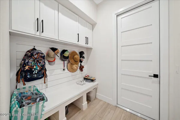 a room with gym equipment and a window